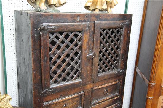An antique Spanish walnut food cupboard, W.2ft 10in. D.1ft 7in. H.4ft 10in.